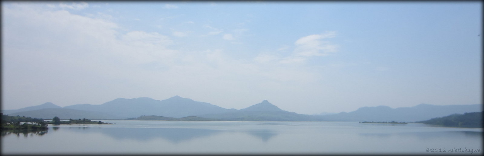 Pawana and Mulshi Lake Tikona Fort in the center. Pawana Lake in foreground